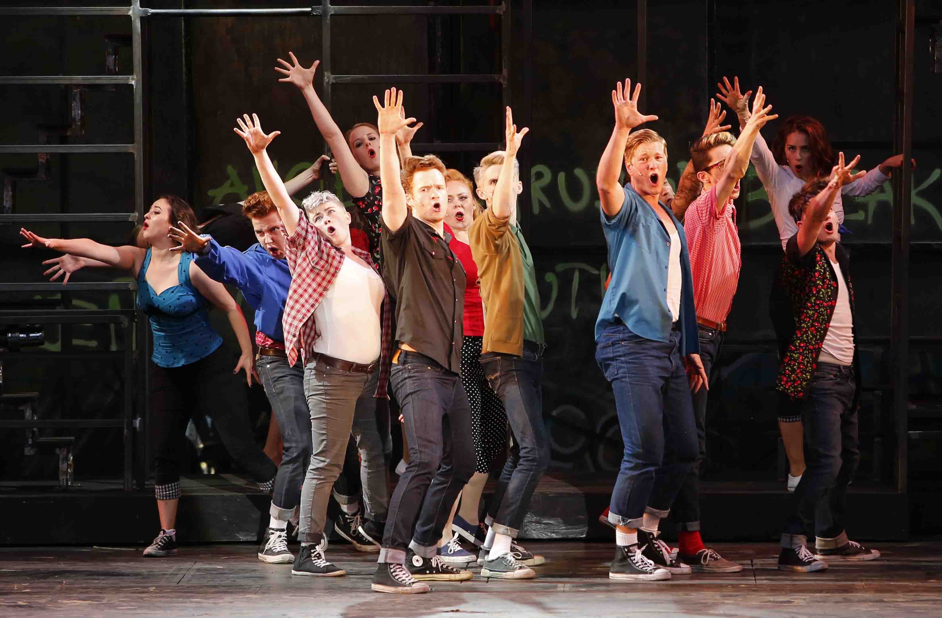 Daniel James White as Riff, with the cast of West Side Story. Photo © Tim Matheson